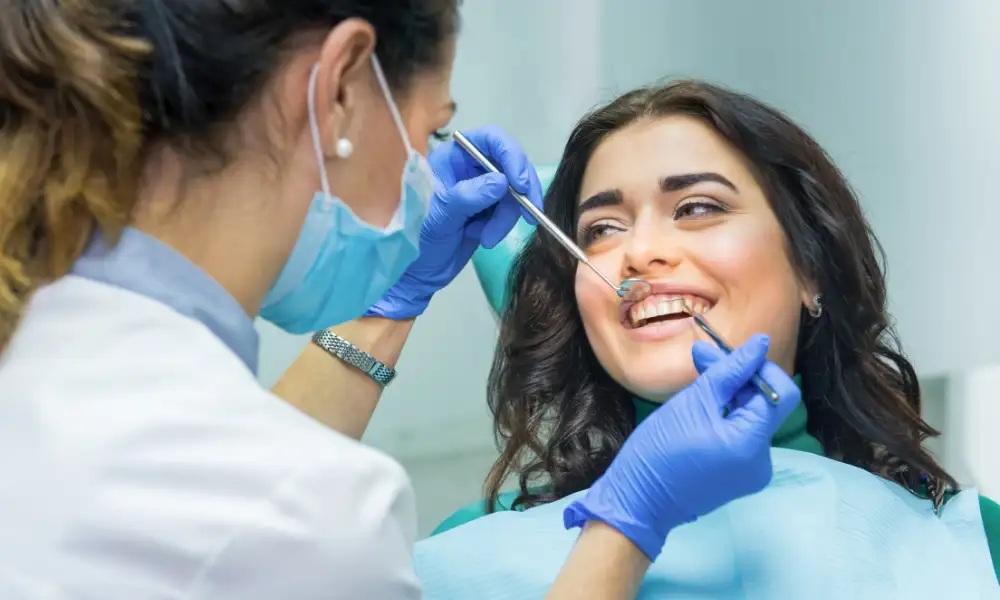 Dentist across from Mapleview mall at Maple Mews Dental treating teenage patient